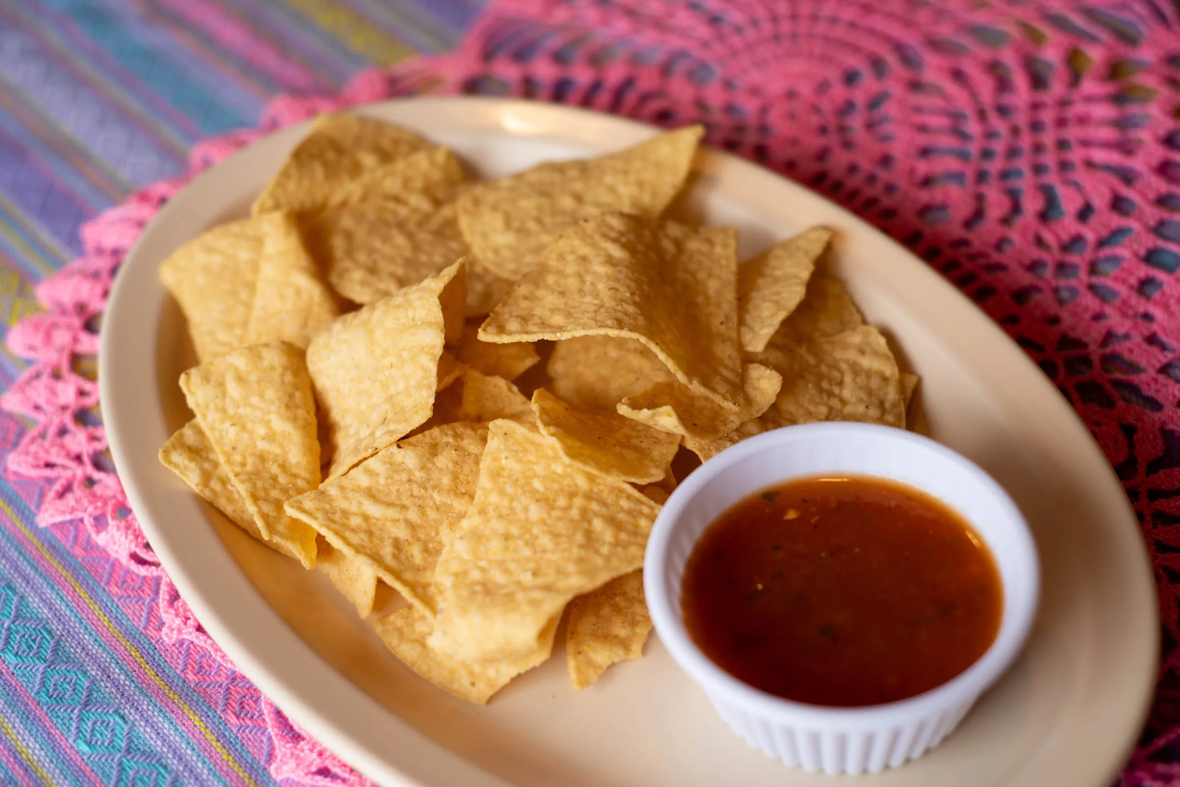 Tortilla chips with a bowl of salsa